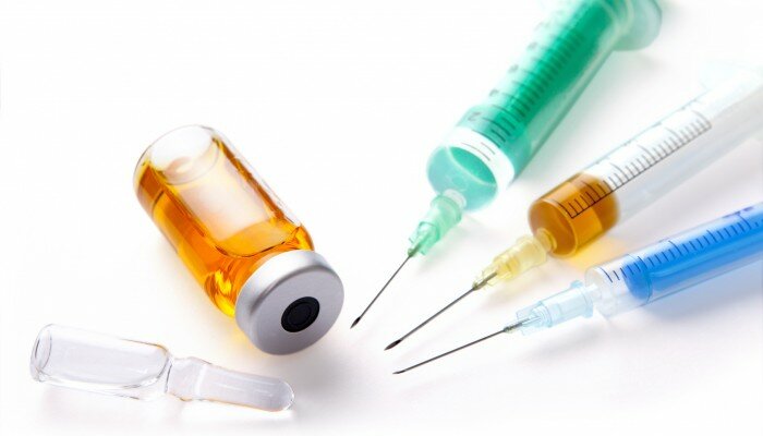 3 filled syringes with two ampoules of drugs isolated